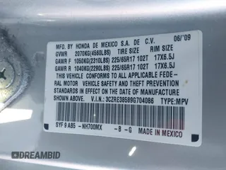 2009 Honda CR-V EX with VIN 3CZRE38589G704086, listed as a IAAI auction lot 41348951 with 128,784 mi miles and . Bid and sale history available at carsss.com. Image 9.
