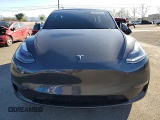 2024 Tesla Model Y with VIN 7SAYGDED7RF108604, listed as a Copart auction lot 48384825 with 24,603 mi miles and Salvage Title. Bid and sale history available at DreamBid. Image 5.