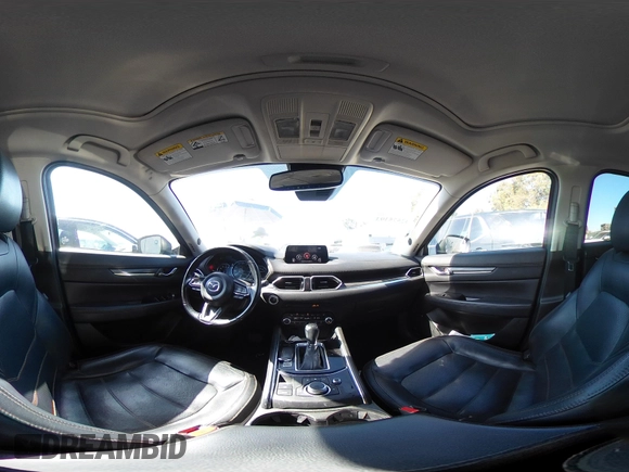 2020 Mazda CX-5 Grand Touring with VIN JM3KFADM3L1812649, listed as a IAAI auction lot 42575393 with 102,118 mi miles and . Bid and sale history available at DreamBid. Image 19.