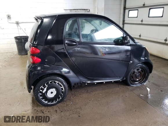 2009 Smart fortwo Pure with VIN WMEEJ31X99K280598, listed as a Copart auction lot 57480915 with 30,628 mi miles and Clean title. Bid and sale history available at DreamBid. Image 3.