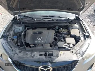 2014 Mazda CX-5 Sport with VIN JM3KE2BE9E0423737, listed as a IAAI auction lot 42222646 with 116,160 mi miles and . Bid and sale history available at DreamBid. Image 10.