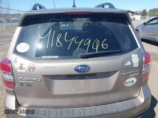 2014 Subaru Forester 2.5i Limited with VIN JF2SJAHC3EH509990, listed as a IAAI auction lot 41844996 with 162,831 mi miles. Bid and sale history available at carsss.com. Image 16.