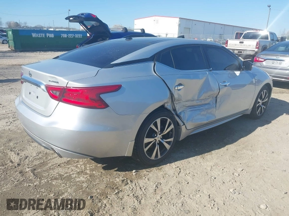 2016 Nissan Maxima SL with VIN 1N4AA6AP6GC448161, listed as a IAAI auction lot 41709077 with 133,288 mi miles and . Bid and sale history available at DreamBid. Image 4.