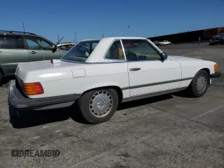 1986 Mercedes-Benz 560 SL z VIN WDBBA48D8GA045467, wystawiony jako Copart lot #57576155 z przebiegiem 64 819 mil mil oraz Tytuł czysty. Historia ofert i sprzedaży dostępna na DreamBid. Obrazek 3.