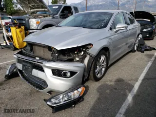 2016 Ford Fusion Energi Titanium with VIN 3FA6P0SU6GR229787, listed as a Copart auction lot 71939402 with 123,693 mi miles. Bid and sale history available at carsss.com. Image 1.
