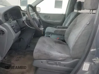 2002 Honda Odyssey EX z VIN 5FNRL18652B014929, wystawiony jako Copart lot #57185775 z przebiegiem 291 807 mil mil oraz Czysty tytuł • Clean title. Historia ofert i sprzedaży dostępna na DreamBid. Obrazek 7.