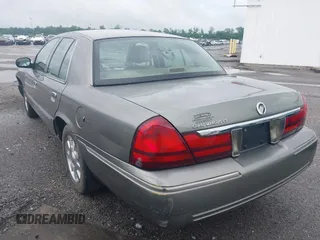 2004 Mercury Grand Marquis LS Premium z VIN 2MEHM75W64X654827, wystawiony jako IAAI lot #41890046 z przebiegiem Nie podano mil oraz . Historia ofert i sprzedaży dostępna na DreamBid. Obrazek 3.