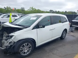 2012 Honda Odyssey EX-L with VIN 5FNRL5H60CB134954, listed as a IAAI auction lot 41942488 with 192,069 mi miles and . Bid and sale history available at DreamBid. Image 18.