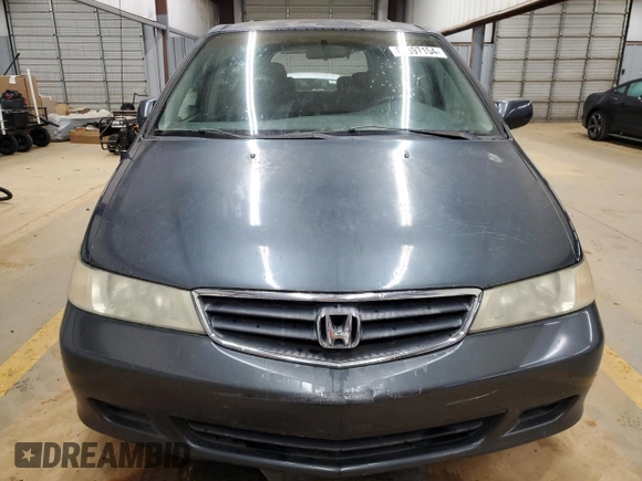 2003 Honda Odyssey EX-L z VIN 5FNRL18993B142649, wystawiony jako Copart lot #86397154 z przebiegiem 339 966 mil mil oraz Szkoda całkowita • Salvage title. Historia ofert i sprzedaży dostępna na DreamBid. Obrazek 5.