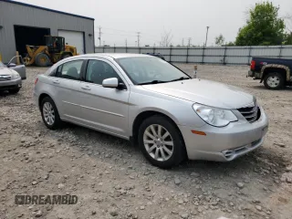 2010 Chrysler Sebring Limited z VIN 1C3CC5FB0AN233881, wystawiony jako Copart lot #58819005 z przebiegiem 162 152 mil mil oraz Nie do naprawy • Non repairable. Historia ofert i sprzedaży dostępna na DreamBid. Obrazek 4.