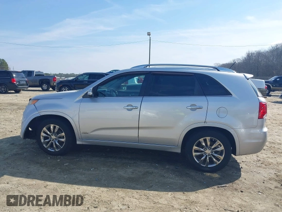 2012 Kia Sorento SX with VIN 5XYKWDA23CG194617, listed as a IAAI auction lot 41504630 with 161,157 mi miles. Bid and sale history available at carsss.com. Image 14.