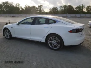 2014 Tesla Model S 60 с VIN 5YJSA1H18EFP33284, выставлен на аукционе Copart как лот 57434905 с пробегом 156 750 миль миль и Списание • Salvage title. История ставок и продаж доступна на DreamBid. Изображение 2.