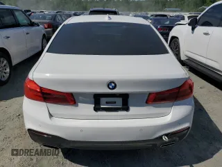 2018 BMW 5 Series 540i xDrive with VIN WBAJE7C52JG891212, listed as a Copart auction lot 58119195 with 73,770 mi miles and Salvage title. Bid and sale history available at DreamBid. Image 6.