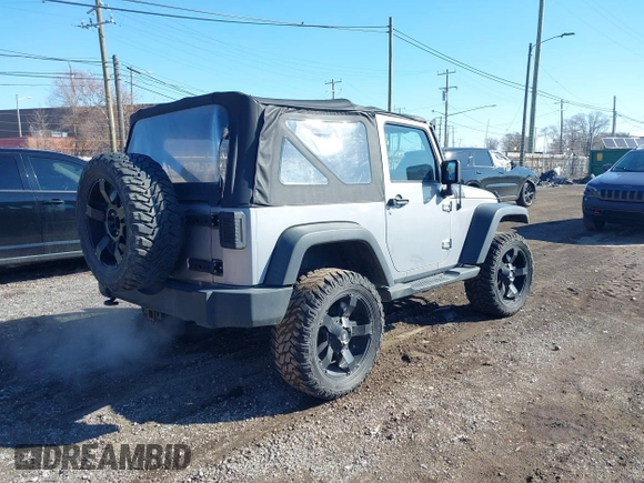 2013 Jeep Wrangler Sport with VIN 1C4AJWAG1DL595509, listed as a IAAI auction lot 41814406 with 59,263 mi miles and . Bid and sale history available at DreamBid. Image 4.