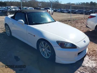 2005 Honda S2000 z VIN JHMAP21475S007194, wystawiony jako IAAI lot #41559872 z przebiegiem 228 541 mil mil oraz . Historia ofert i sprzedaży dostępna na DreamBid. Obrazek 1.