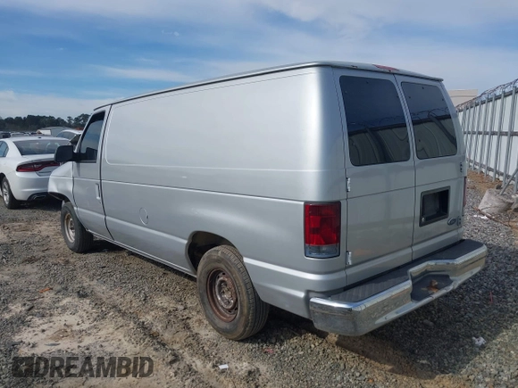 1998 Ford Econoline Cargo with VIN 1FTRE1428WHB30628, listed as a IAAI auction lot 41706164 with 153,223 mi miles. Bid and sale history available at carsss.com. Image 3.