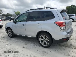 2017 Subaru Forester Touring with VIN JF2SJAWC6HH556728, listed as a Copart auction lot 54914055 with 112,686 mi miles and Salvage title. Bid and sale history available at DreamBid. Image 2.