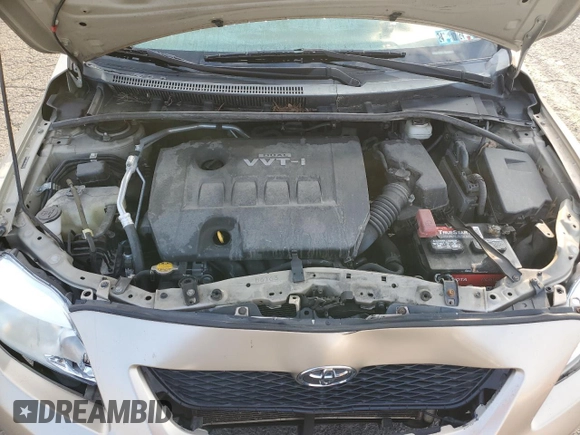 2010 Toyota Corolla with VIN 2T1BU4EE8AC333112, listed as a Copart auction lot 42008215 with 90,670 mi miles and Salvage title. Bid and sale history available at DreamBid. Image 11.