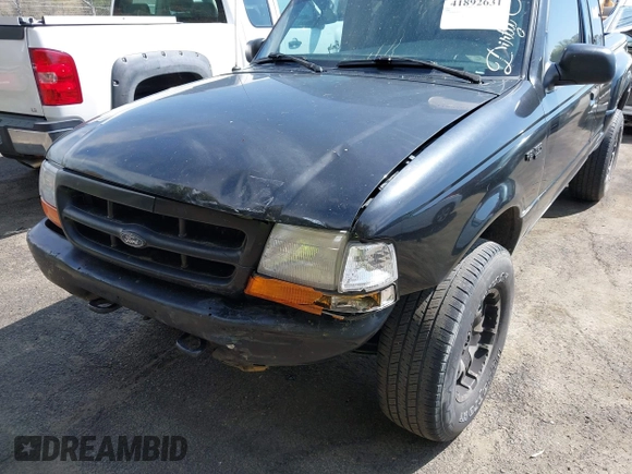 1999 Ford Ranger XL with VIN 1FTZR15V3XPB55652, listed as a IAAI auction lot 41892631 with 238,995 mi miles. Bid and sale history available at carsss.com. Image 6.