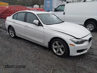 2014 BMW 3 Series 328i xDrive with VIN WBA3B3G56ENR81985, listed as a IAAI auction lot 41416541 with 126,595 mi miles. Bid and sale history available at carsss.com. Image 1.