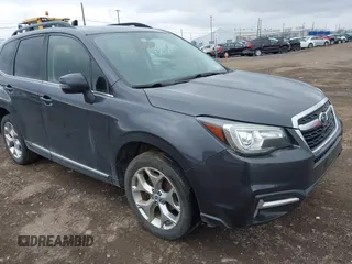2017 Subaru Forester Touring with VIN JF2SJATC5HH518783, listed as a IAAI auction lot 41889172 with 115,801 mi miles and . Bid and sale history available at DreamBid. Image 1.