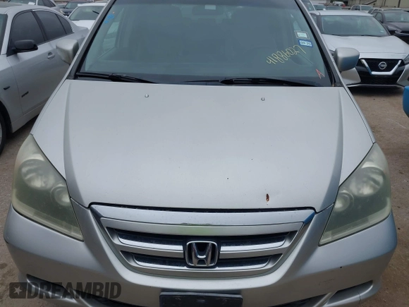 2005 Honda Odyssey EX-L with VIN 5FNRL38625B421123, listed as a IAAI auction lot 41886027 with 174,459 mi miles. Bid and sale history available at carsss.com. Image 10.