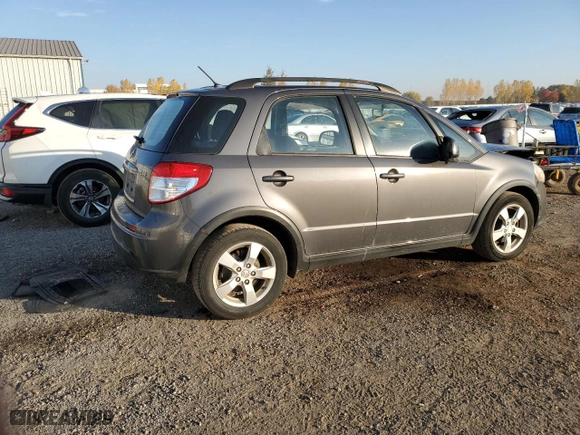 2011 Suzuki SX4 Hatchback JX with VIN JS2YA5A29B6300087, listed as a Copart auction lot 76692734 with 262,599 mi miles and Salvage Title. Bid and sale history available at carsss.com. Image 3.