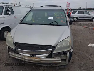 2005 Honda Odyssey EX with VIN 5FNRL38435B071998, listed as a IAAI auction lot 41808601 with 999,999 mi miles. Bid and sale history available at carsss.com. Image 6.