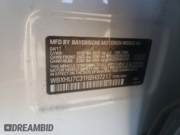 2017 BMW X1 sDrive28i with VIN WBXHU7C31H5H37217, listed as a Copart auction lot 70114342 with 73,683 mi miles. Bid and sale history available at carsss.com. Image 13.