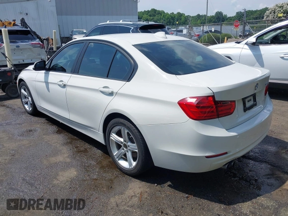 2014 BMW 3 Series 328i with VIN WBA3C1C5XEK107826, listed as a IAAI auction lot 42481701 with 104,151 mi miles and . Bid and sale history available at DreamBid. Image 3.