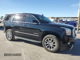 2019 GMC Yukon Denali with VIN 1GKS2CKJ9KR186604, listed as a Copart auction lot 82201124 with 110,069 mi miles and Salvage Title. Bid and sale history available at DreamBid. Image 4.
