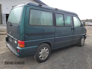 2002 Volkswagen EuroVan MV с VIN WV2NB47092H095600, выставлен на аукционе Copart как лот 50705065 с пробегом 223 049 миль миль и Чистый • Clean title. История ставок и продаж доступна на DreamBid. Изображение 3.