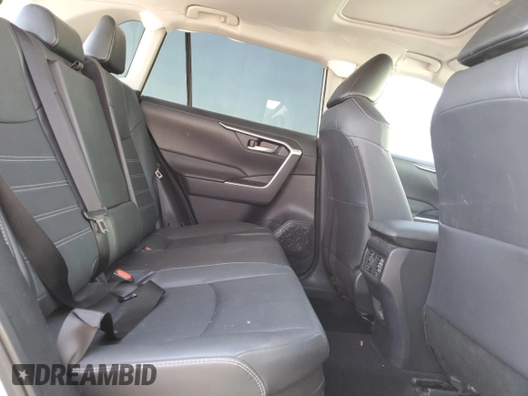 2024 Toyota RAV4 Hybrid XLE Premium with VIN JTMB6RFV6RD120633, listed as a Copart auction lot 57620825 with 28,817 mi miles and Salvage title. Bid and sale history available at DreamBid. Image 11.