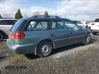 1995 Subaru Legacy L with VIN 4S3BK6358S6352272, listed as a Copart auction lot 46073325 with 211,502 mi miles and Salvage title. Bid and sale history available at DreamBid. Image 3.