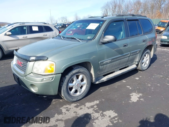 2004 GMC Envoy SLE with VIN 1GKDT13S942254932, listed as a IAAI auction lot 41509407 with 213,068 mi miles. Bid and sale history available at carsss.com. Image 2.
