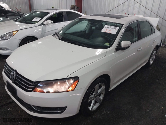2013 Volkswagen Passat SE w/Sunroof with VIN 1VWBH7A35DC111003, listed as a IAAI auction lot 41991990 with 142,103 mi miles. Bid and sale history available at carsss.com. Image 17.