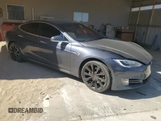 2017 Tesla Model S 60 z VIN 5YJSA1E18HF192715, wystawiony jako Copart lot #56851225 z przebiegiem 103 231 mil mil oraz Szkoda całkowita • Salvage title. Historia ofert i sprzedaży dostępna na DreamBid. Obrazek 4.