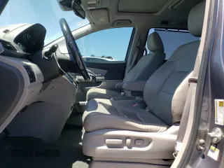 2014 Honda Odyssey Touring с VIN 5FNRL5H92EB116923, выставлен на аукционе Copart как лот 58060645 с пробегом 106 285 миль миль и Списание • Salvage title. История ставок и продаж доступна на DreamBid. Изображение 7.