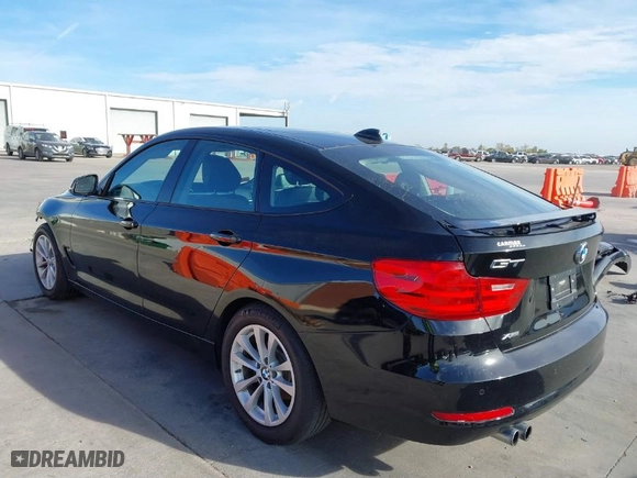 2014 BMW 3 Series Gran Turismo 328i xDrive with VIN WBA3X5C58ED556096, listed as a IAAI auction lot 40979072 with 80,544 mi miles. Bid and sale history available at carsss.com. Image 3.