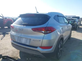 2017 Hyundai Tucson Value with VIN KM8J33A22HU457809, listed as a IAAI auction lot 41632652 with 26,154 mi miles. Bid and sale history available at carsss.com. Image 4.