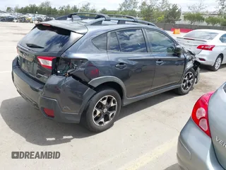 2018 Subaru Crosstrek Premium z VIN JF2GTACC9JH215303, wystawiony jako IAAI lot #42228185 z przebiegiem 71 170 mil mil oraz . Historia ofert i sprzedaży dostępna na DreamBid. Obrazek 4.