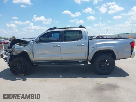 2018 Toyota Tacoma SR with VIN 3TMCZ5AN2JM172829, listed as a IAAI auction lot 42073847 with 136,671 mi miles and . Bid and sale history available at carsss.com. Image 15.