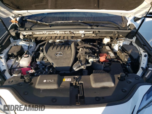 2023 Lexus NX with VIN 2T2KGCEZ7PC027611, listed as a Copart auction lot 72510804 with 19,525 mi miles and Salvage Title. Bid and sale history available at carsss.com. Image 12.
