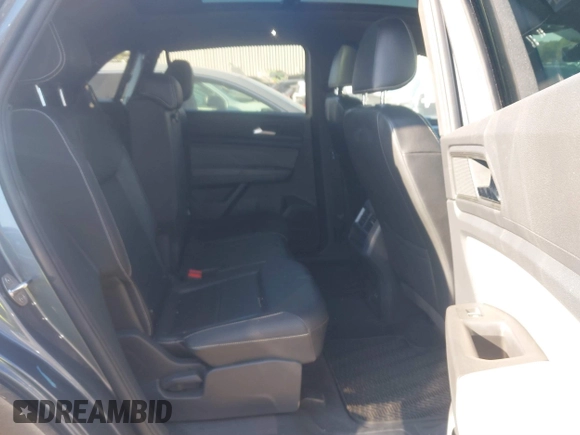 2022 Volkswagen Atlas SE with VIN 1V2JE2CA6NC208457, listed as a IAAI auction lot 40999391 with 40,409 mi miles and . Bid and sale history available at DreamBid. Image 8.