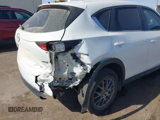 2017 Mazda CX-5 Sport with VIN JM3KFABL5H0124725, listed as a IAAI auction lot 40487298 with 103,889 mi miles. Bid and sale history available at carsss.com. Image 6.