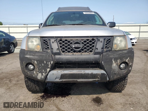 2010 Nissan Xterra SE z VIN 5N1AN0NW5AC509239, wystawiony jako Copart lot #59434865 z przebiegiem 106 209 mil mil oraz Czysty tytuł • Clean title. Historia ofert i sprzedaży dostępna na DreamBid. Obrazek 5.