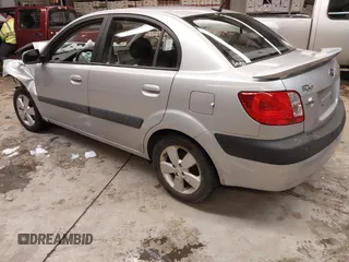 2009 Kia Rio LX with VIN KNADE223596444133, listed as a IAAI auction lot 41598865 with Not Provided miles and . Bid and sale history available at DreamBid. Image 3.
