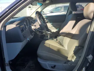 2006 Dodge Magnum z VIN 2D4FV47V46H412577, wystawiony jako Copart lot #77416204 z przebiegiem 244 741 mil mil oraz Szkoda całkowita • Salvage title. Historia ofert i sprzedaży dostępna na DreamBid. Obrazek 7.