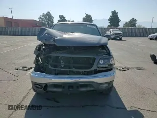 2002 Ford F-150 XL with VIN 1FTPX18L32NB65156, listed as a Copart auction lot 61418955 with 176,622 mi miles and Salvage title. Bid and sale history available at DreamBid. Image 13.