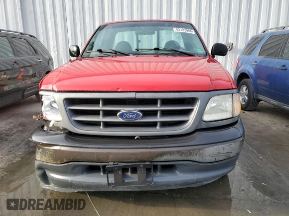 2001 Ford F-150 XL z VIN 3FTZF17291MA72686, wystawiony jako Copart lot #83103904 z przebiegiem 126 018 mil mil oraz Szkoda całkowita • Salvage title. Historia ofert i sprzedaży dostępna na DreamBid. Obrazek 5.